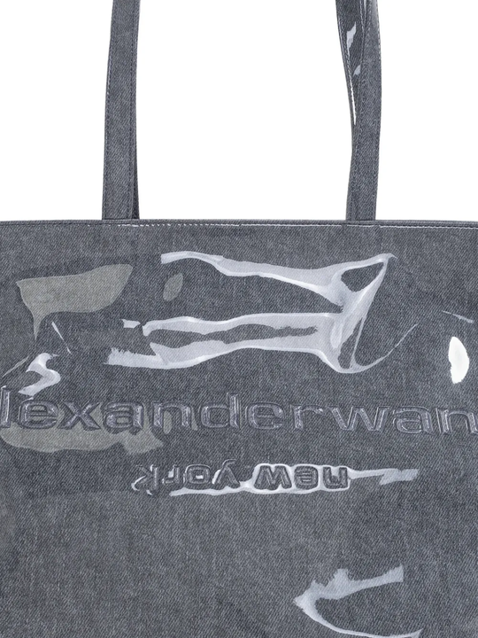 Close up of gray tote bag,showing texture of the polyurethane fabric