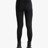 Black pants worn by a person, showing the pants fit