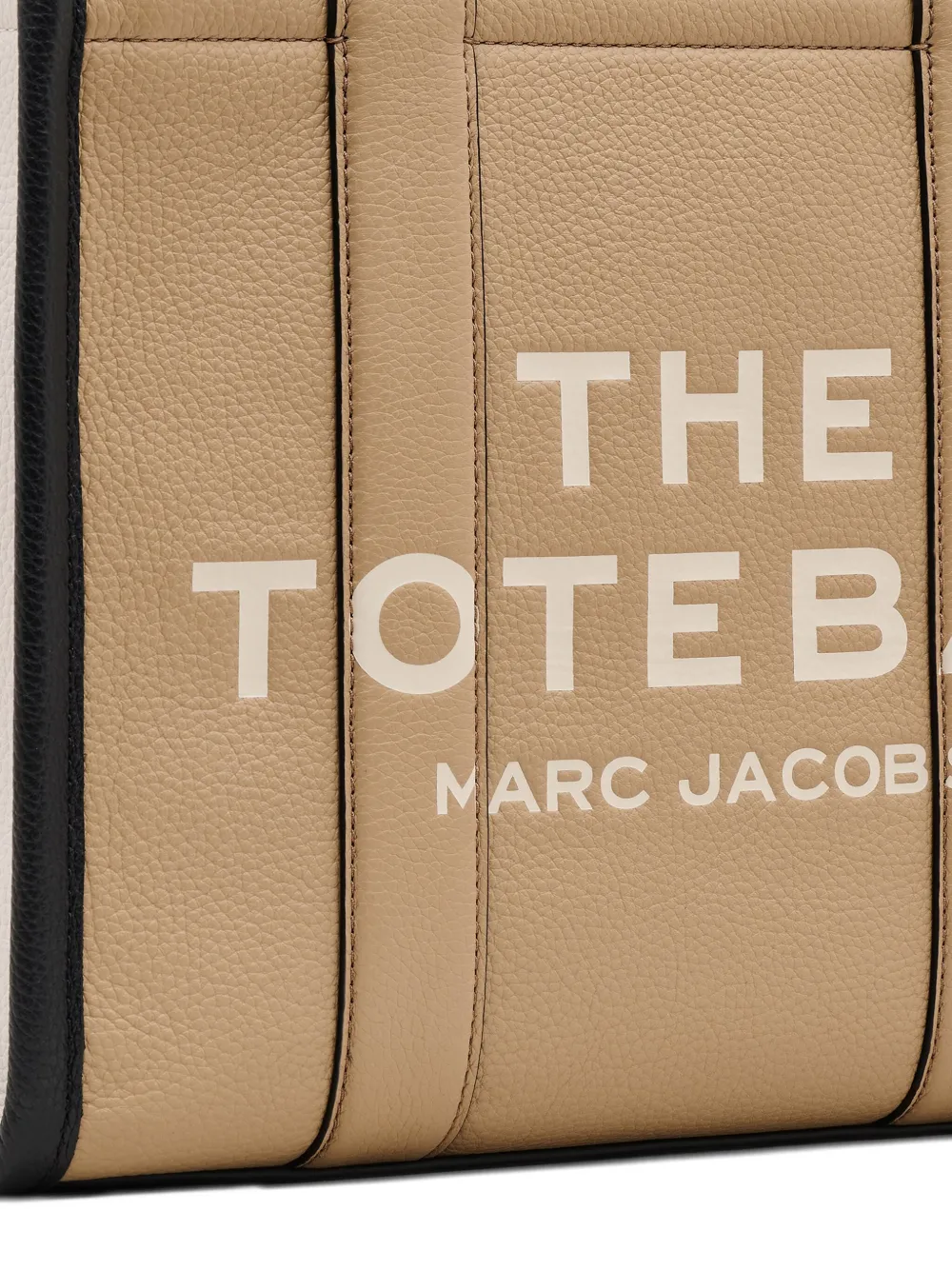 Close up of brown bag, showing texture of the leather fabric