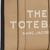 Close up of brown bag, showing texture of the leather fabric