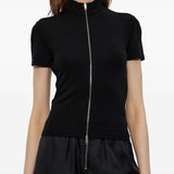 Black top worn by a person, showing the top's fit