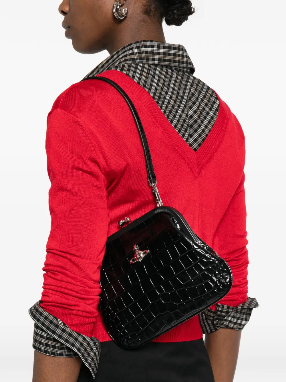 Black bag worn by a person, showing the black bag's fit