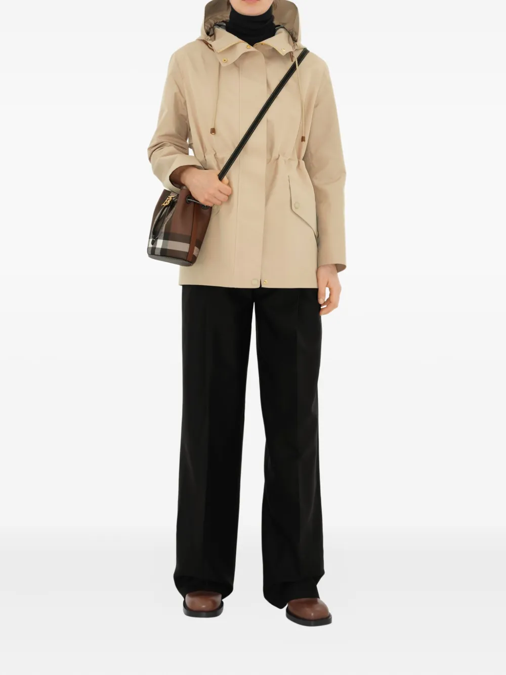 Brown bag worn by a person, showing the bag's fit