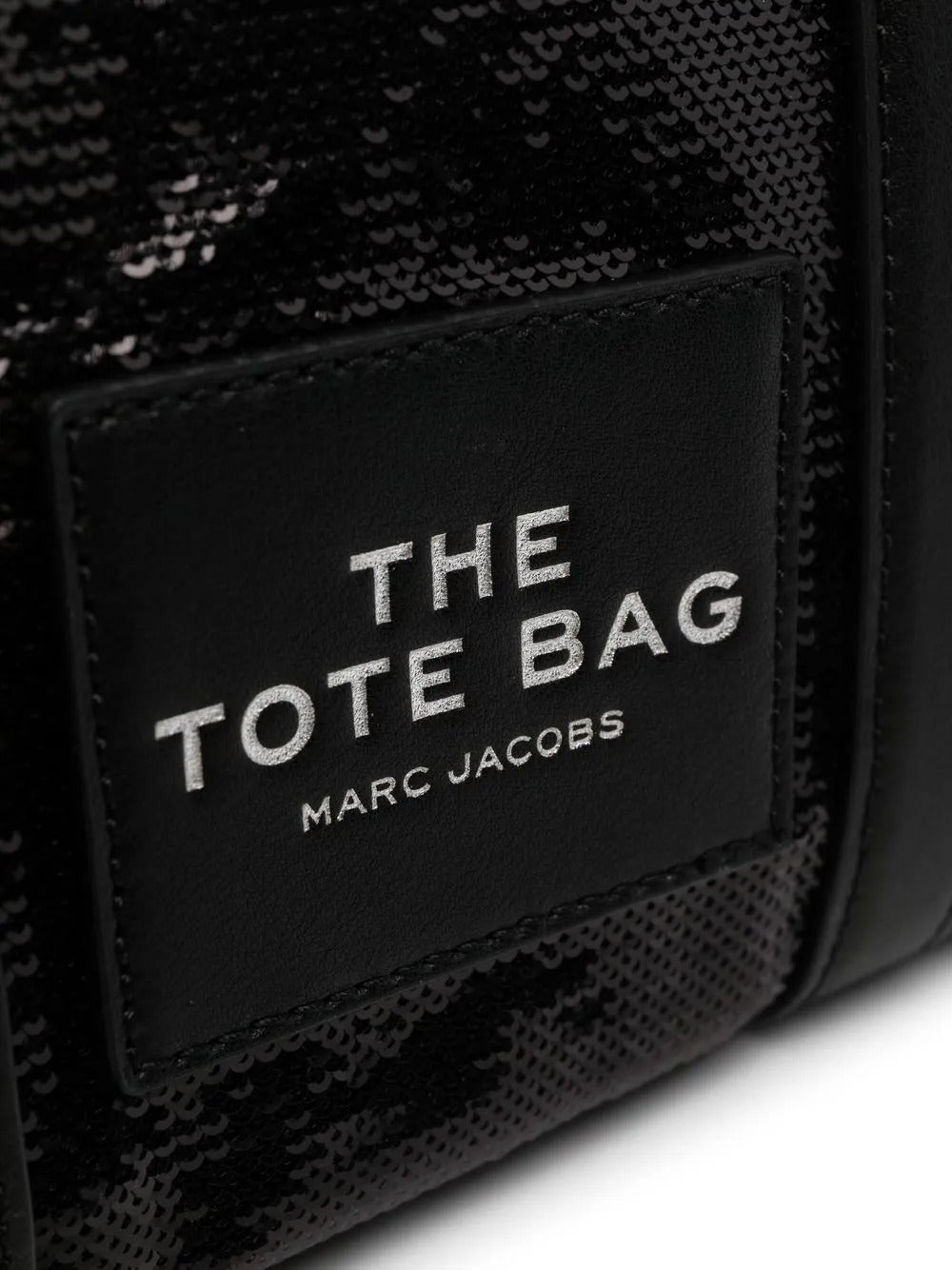 Close up of the black bag, showing texture of the polyurethane fabric