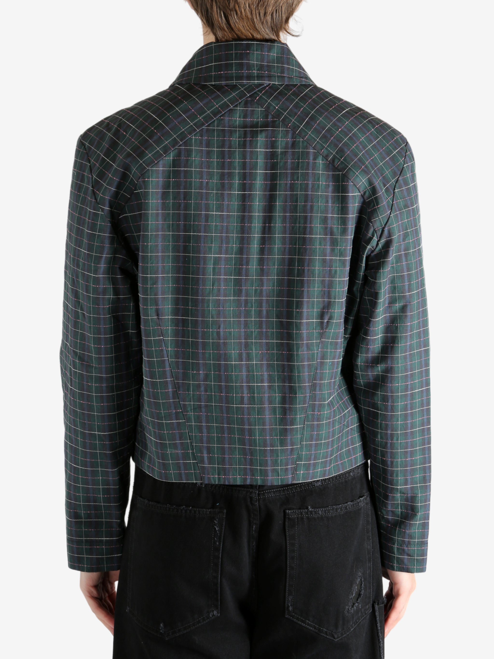 Green blouson worn by a person, showing the blouson's fit