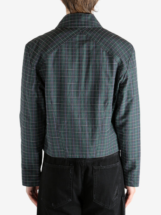 Green blouson worn by a person, showing the blouson's fit