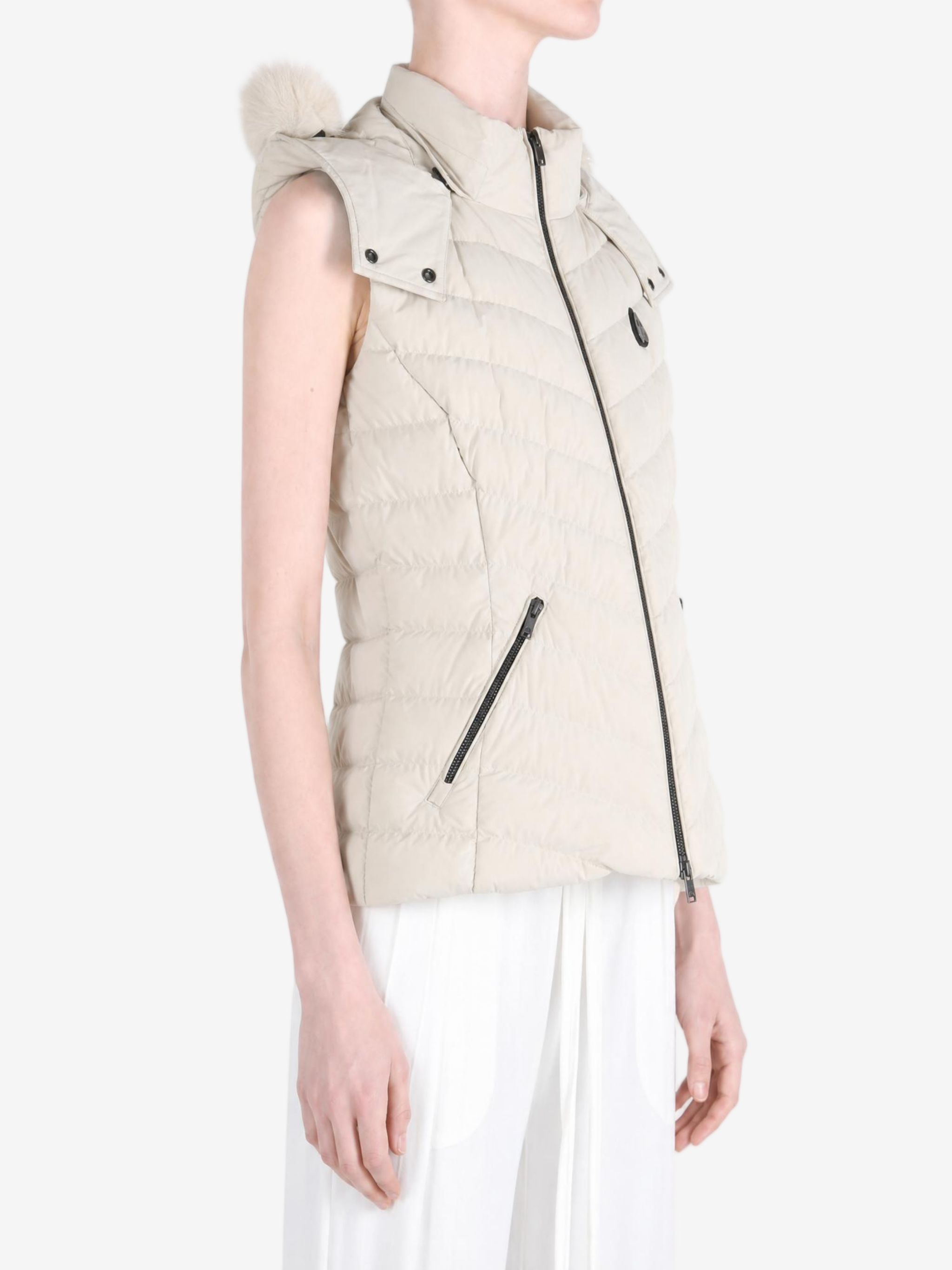 Tan jacket worn by a person, showing the jacket fit