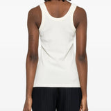 Tan top worn by a person, showing the top fit