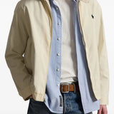 Tan jacket worn by a person, showing the jacket fit