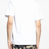Whitet-shirt worn by a person, showing the shirt's fit