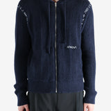 Navy cardigan worn by a person, showing the cardigan's fit