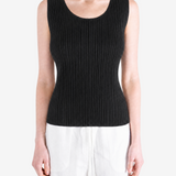 Black shirt worn by a person, showing the shirt fit