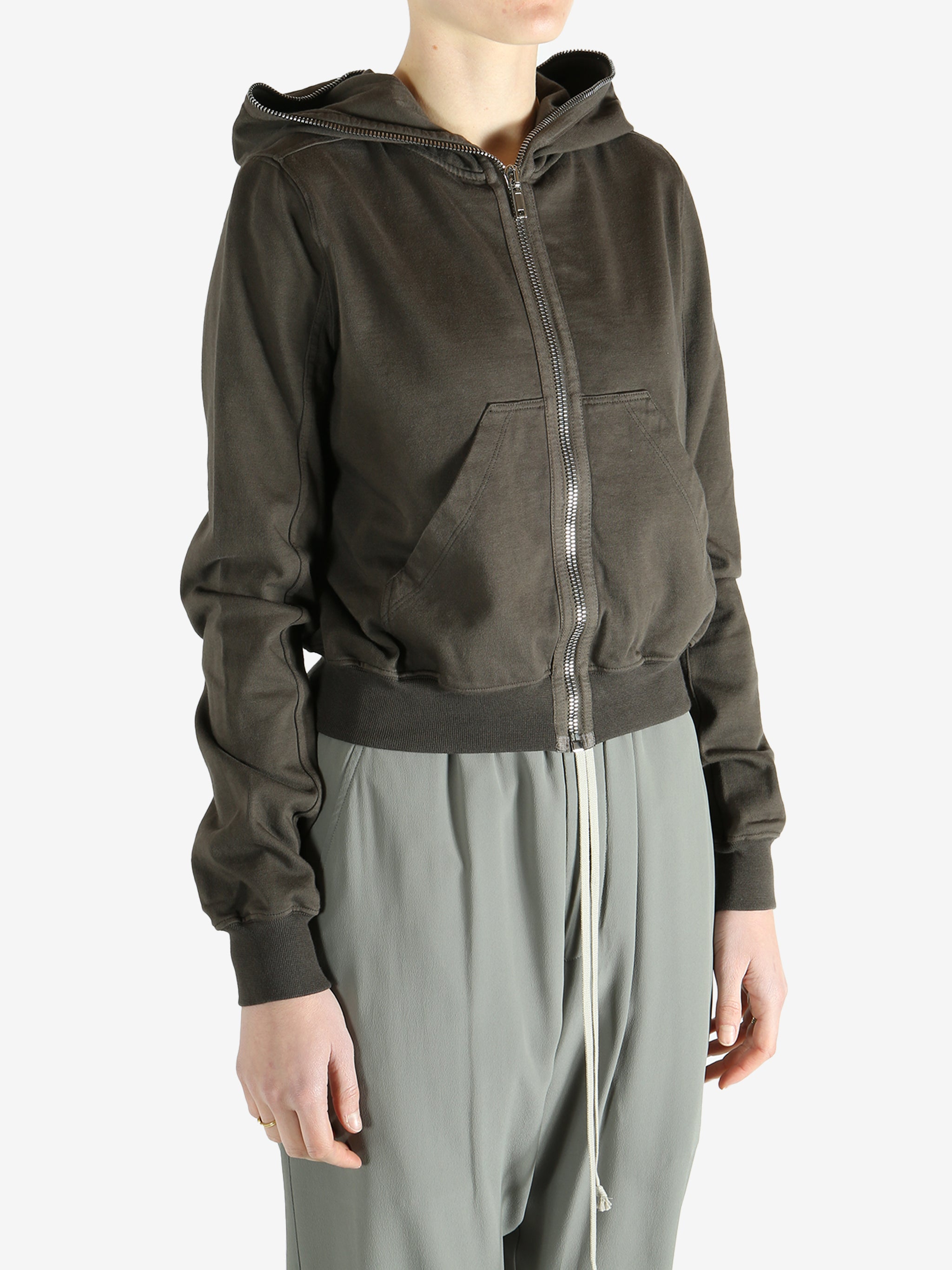 Grey weats-hoodies worn by a person, showing the sweats-hoodies fit