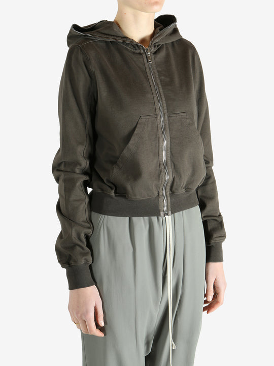 Grey weats-hoodies worn by a person, showing the sweats-hoodies fit