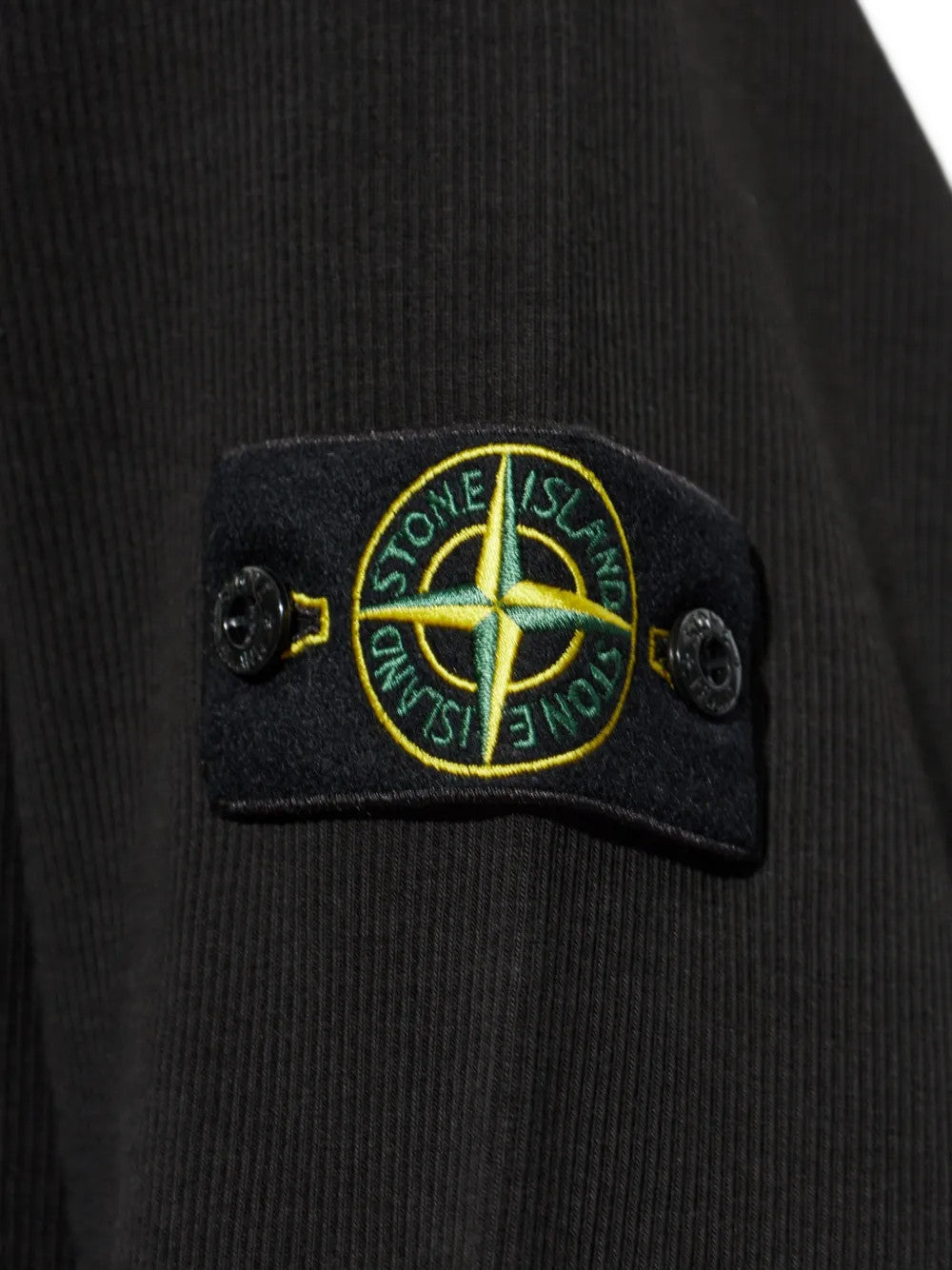 Close up of Black hoodie, showing texture of the 100% cotton fabric