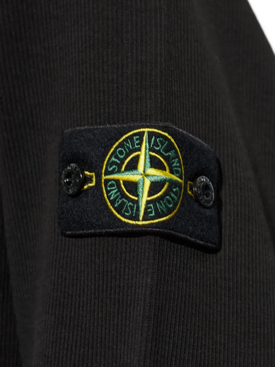Close up of Black hoodie, showing texture of the 100% cotton fabric