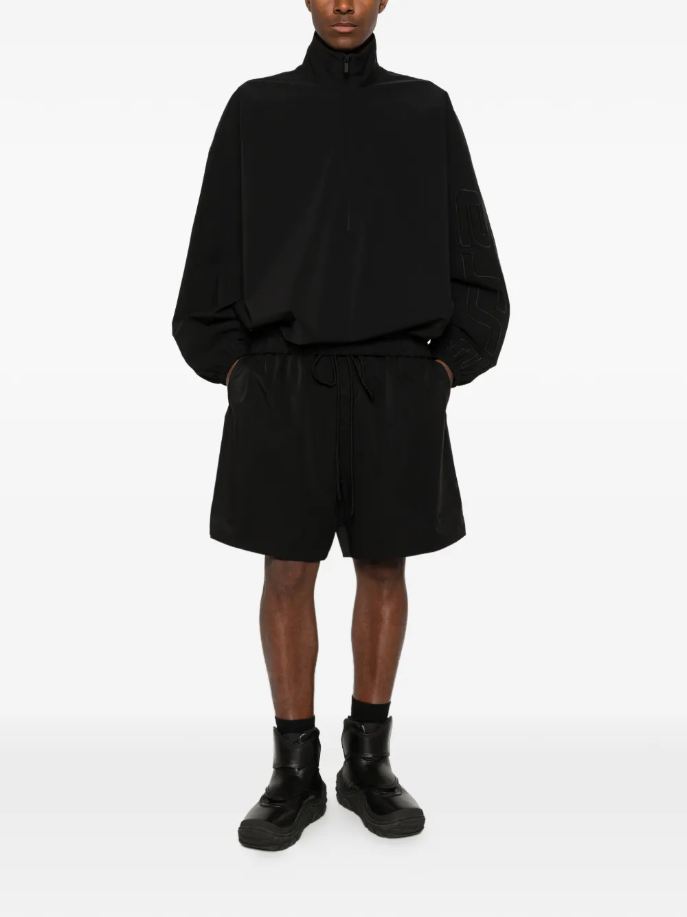 Black coats, full body view