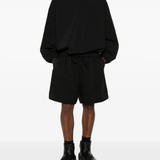 Black coats, full body view