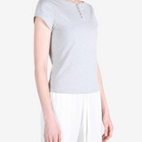 Grey shirt worn by a person, showing the shirt fit