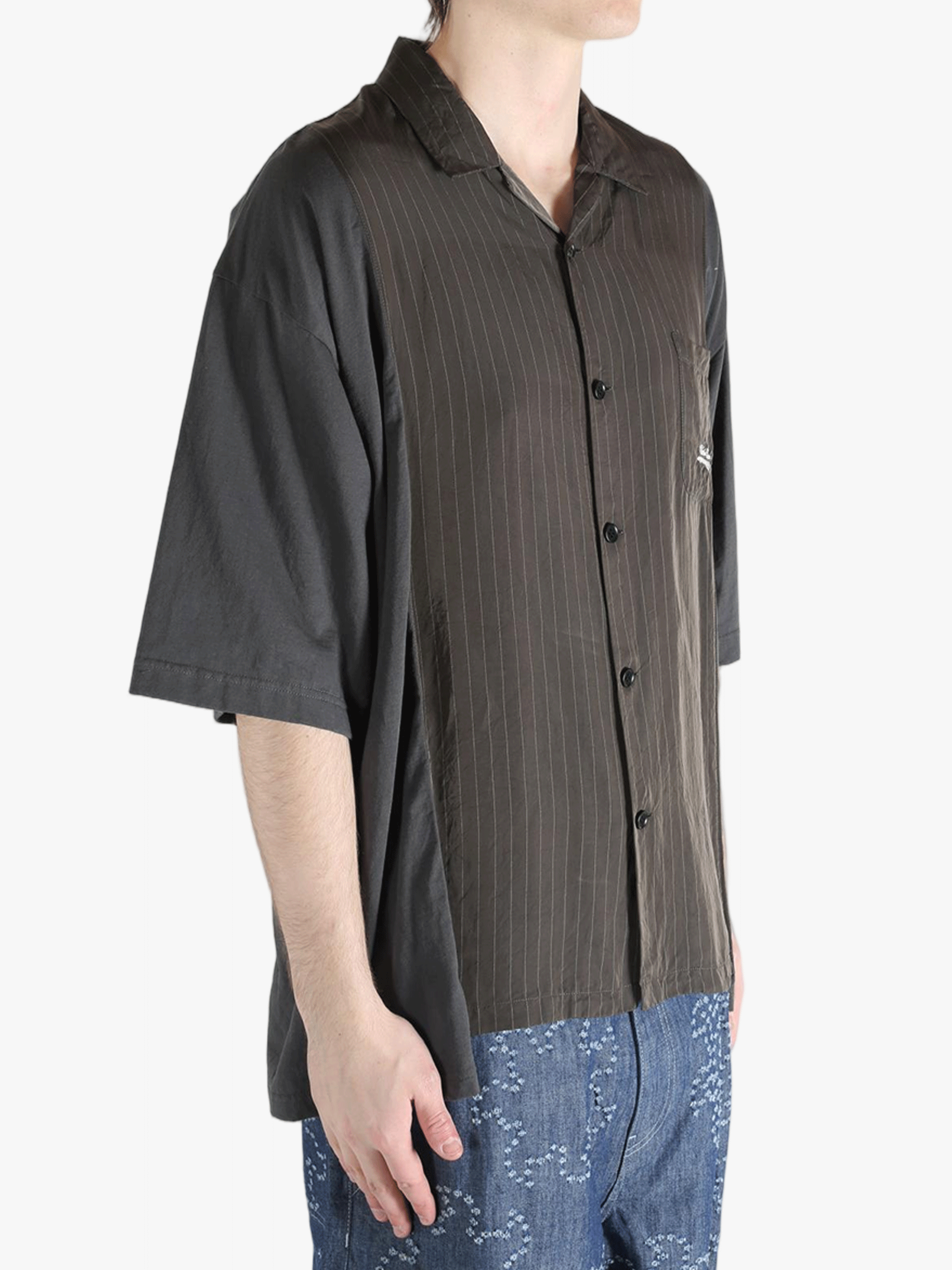 Brown shirt worn by a person, showing the shirt's fit