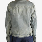 Grey jacket worn by a person, showing the jacket fit