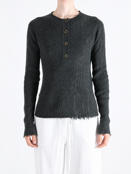 Grey top worn by a person, showing the top fit
