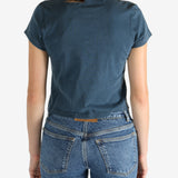 Blue t-shirt worn by a person, showing the shirt's fit