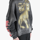 Black hoodie worn by a person, showing the hoodie fit