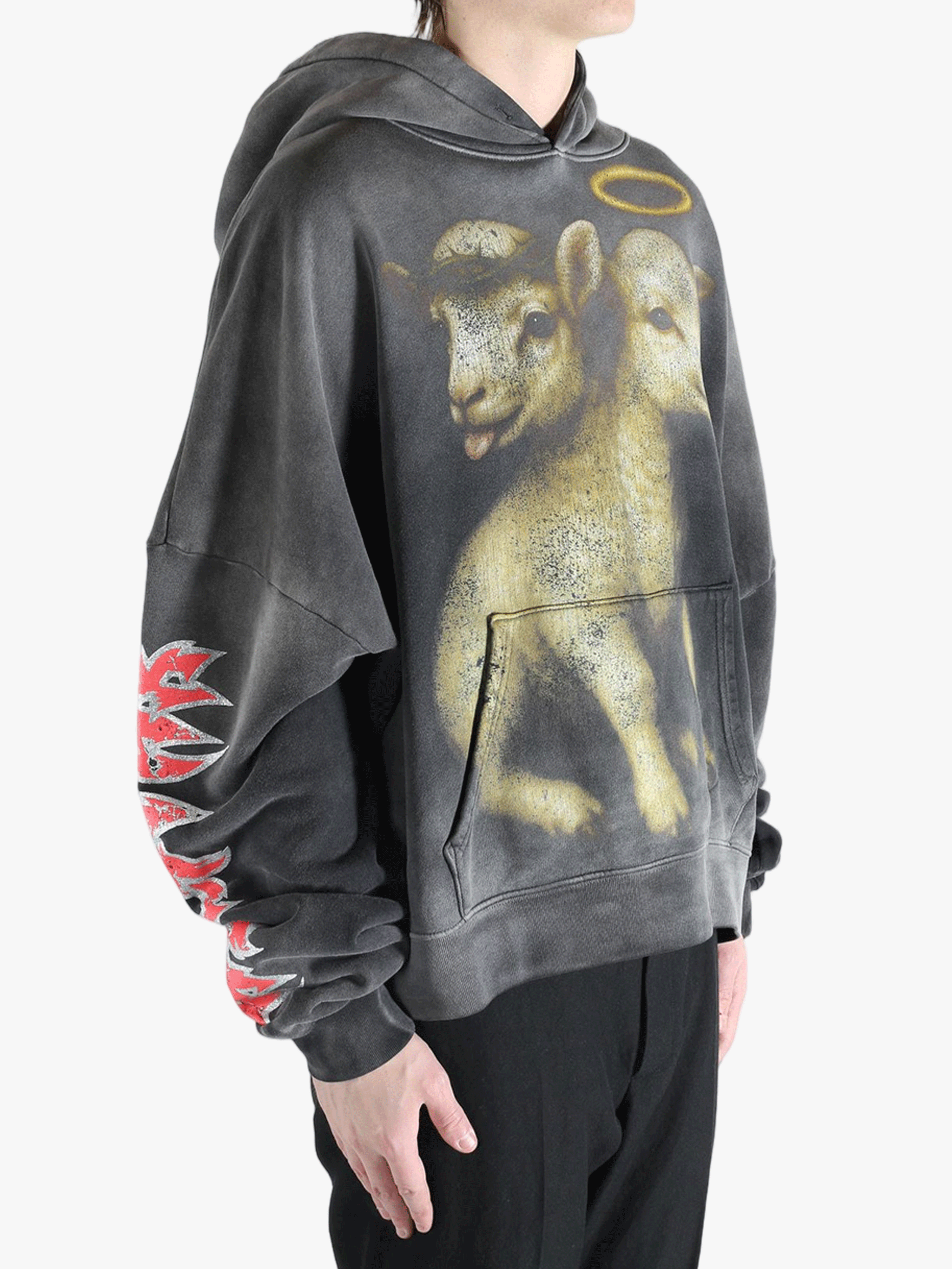 Black hoodie worn by a person, showing the hoodie fit