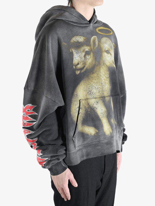 Black hoodie worn by a person, showing the hoodie fit