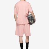 Pink shorts, full body view