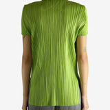 Green shirt worn by a person, showing the shirt's fit