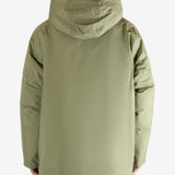 Green jacket worn by a person, showing the jacket's fit