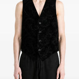 Black jacket worn by a person, showing the jacket fit
