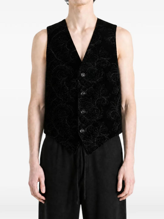 Black jacket worn by a person, showing the jacket fit