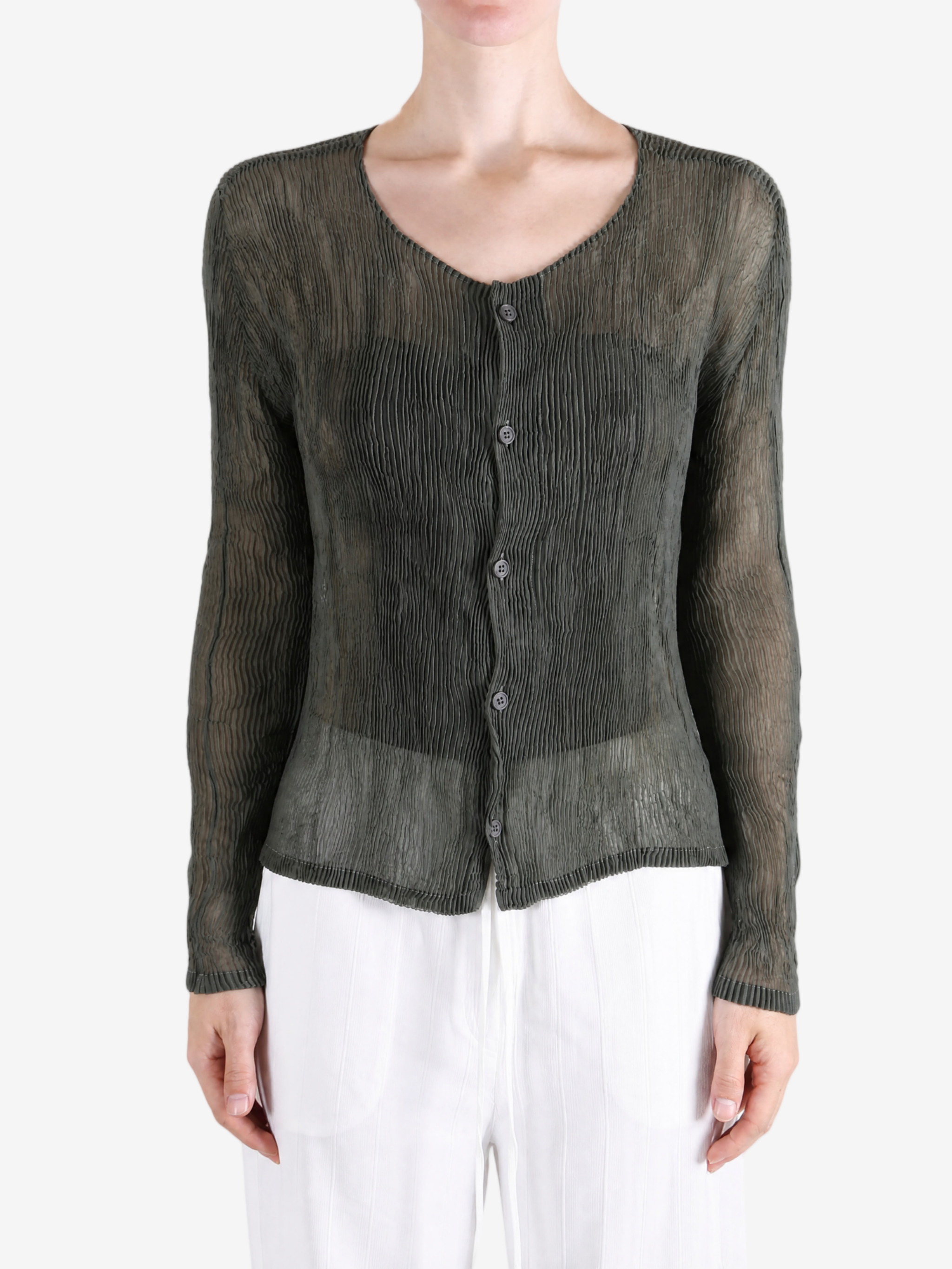 Green shirt worn by a person, showing the shirt fit