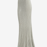 Green skirt worn by a person, showing the skirt fit