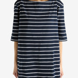 Navy top worn by a person, showing the top's fit