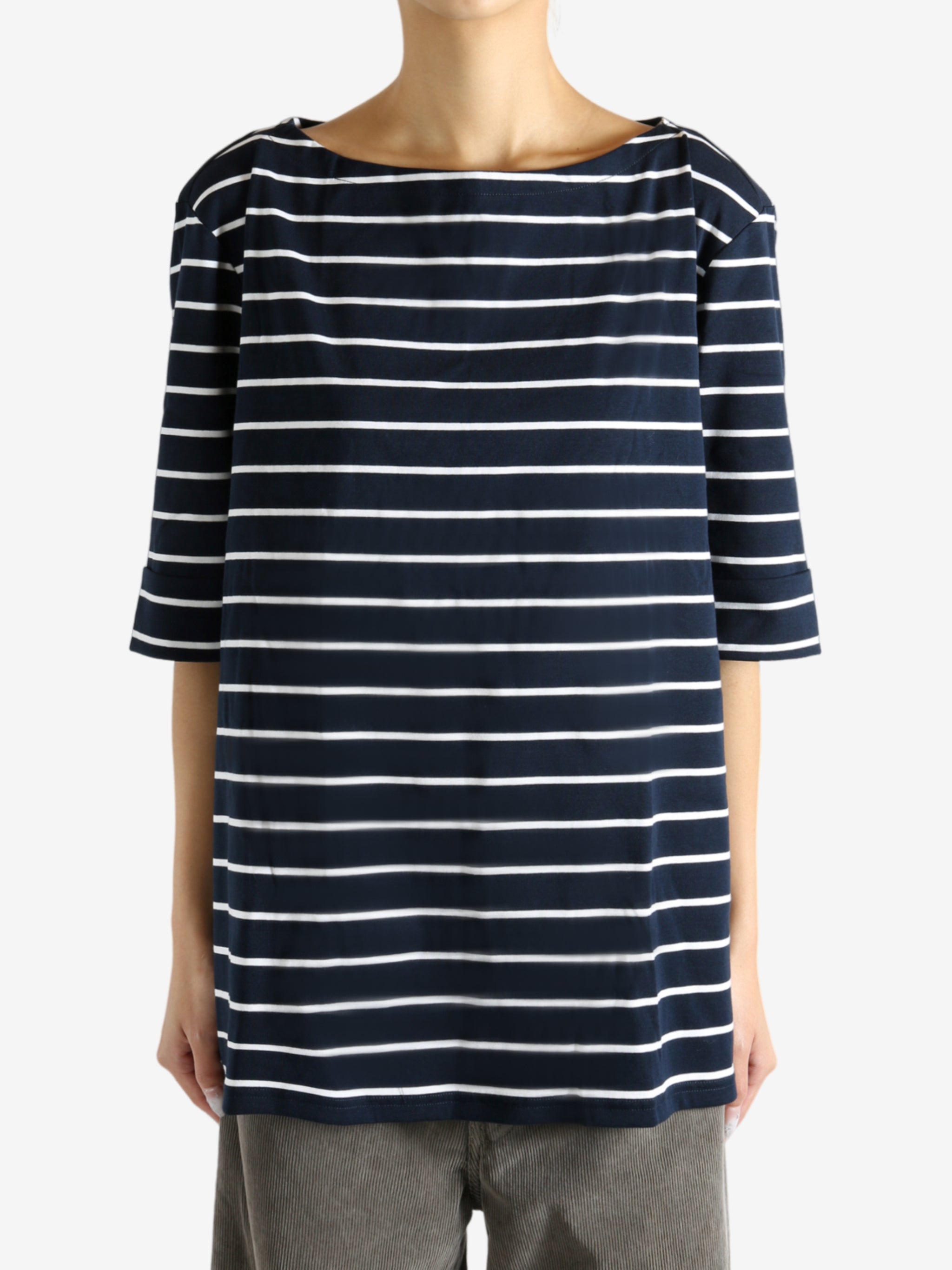 Navy top worn by a person, showing the top's fit