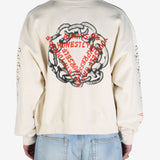 White sweatshirt,w orn by a person showing the sweats fit