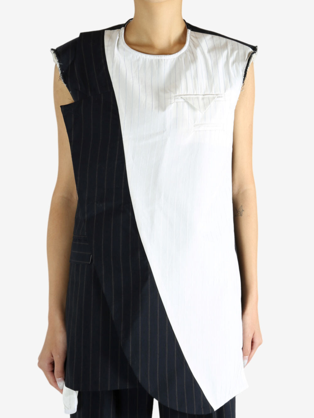 Navy dress worn by a person, showing the dress' fit