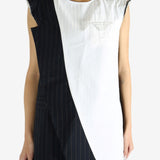 Navy dress worn by a person, showing the dress' fit