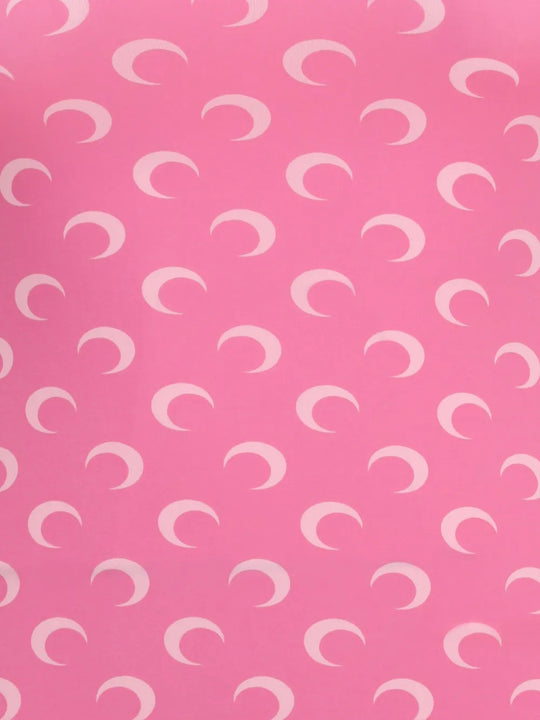 Close up of Pink top, showing texture of the 88% recycled polyamide/ 12% recycled elastane made fabric
