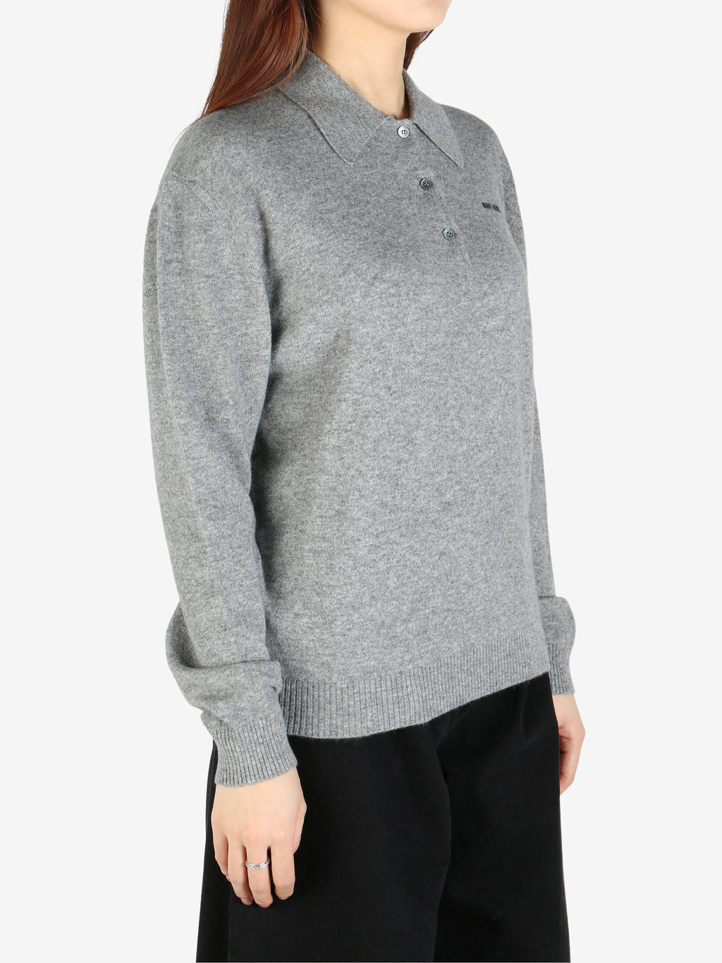 Grey knitwear, side view