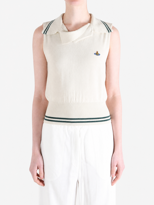 Tan top worn by a person, showing the top fit