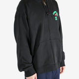 Black jacket worn by a person, showing the jacket's fit