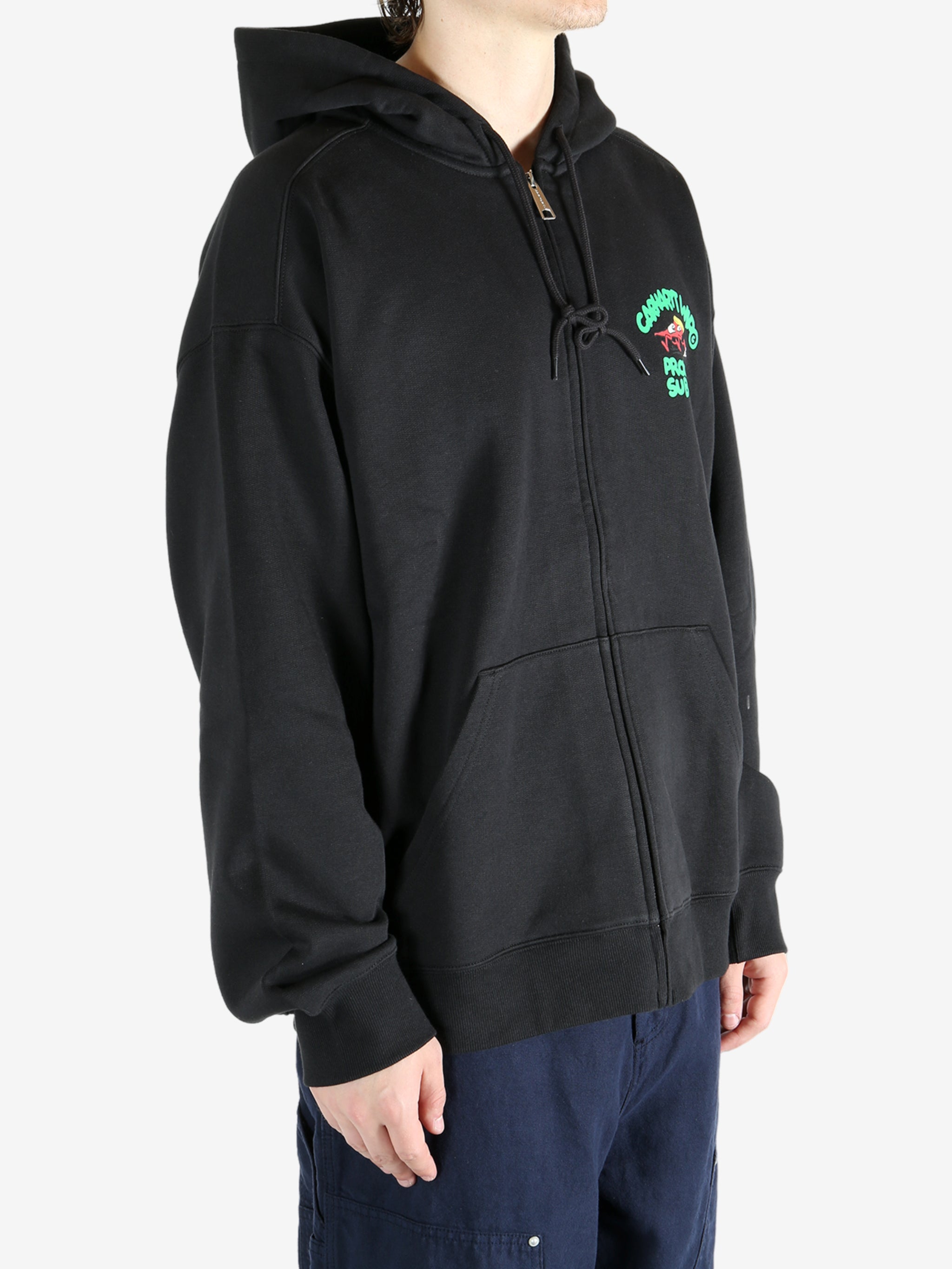 Black jacket worn by a person, showing the jacket's fit