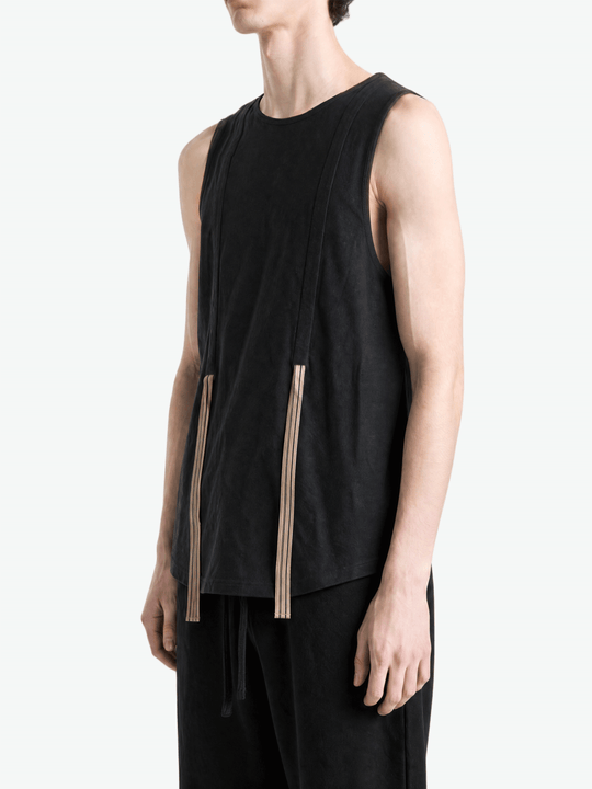 Black top worn by a person, showing the top fit