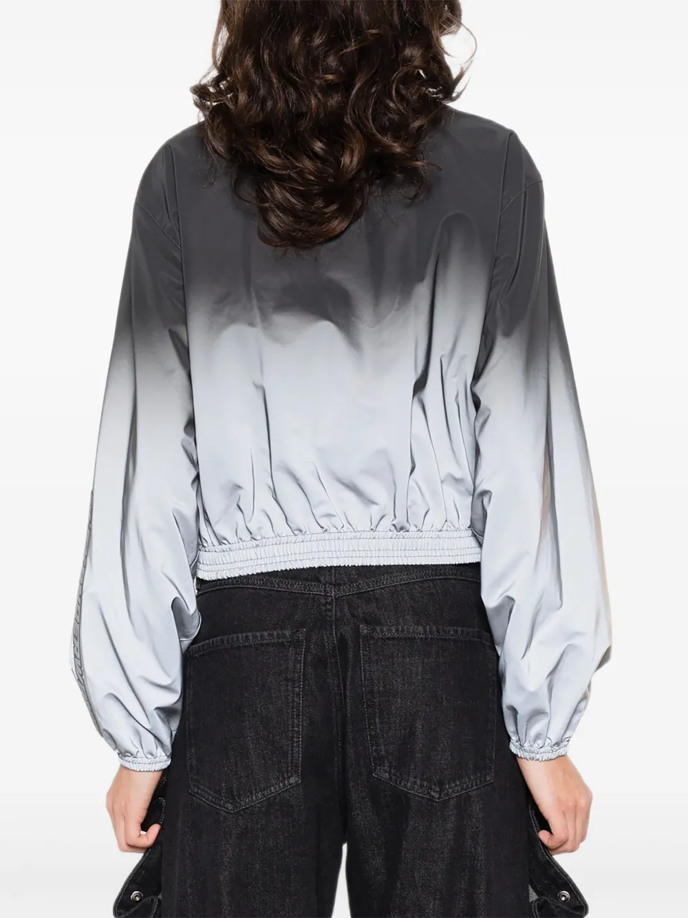 grey  jacket,worn by a person, showing the jacket fit