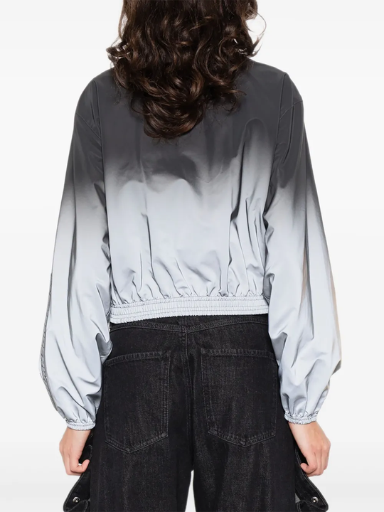 grey  jacket,worn by a person, showing the jacket fit